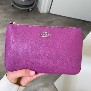 Purple leather coach wristlet wallet
